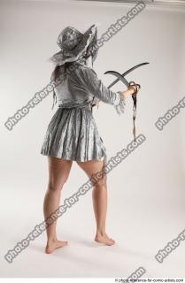 Luci_Aviol Standing Pose With Two Stords